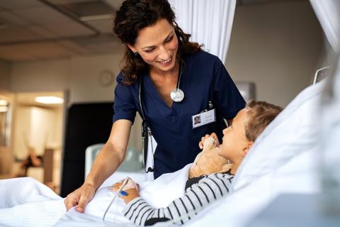 Healthcare Communication Solutions nurse with young patient