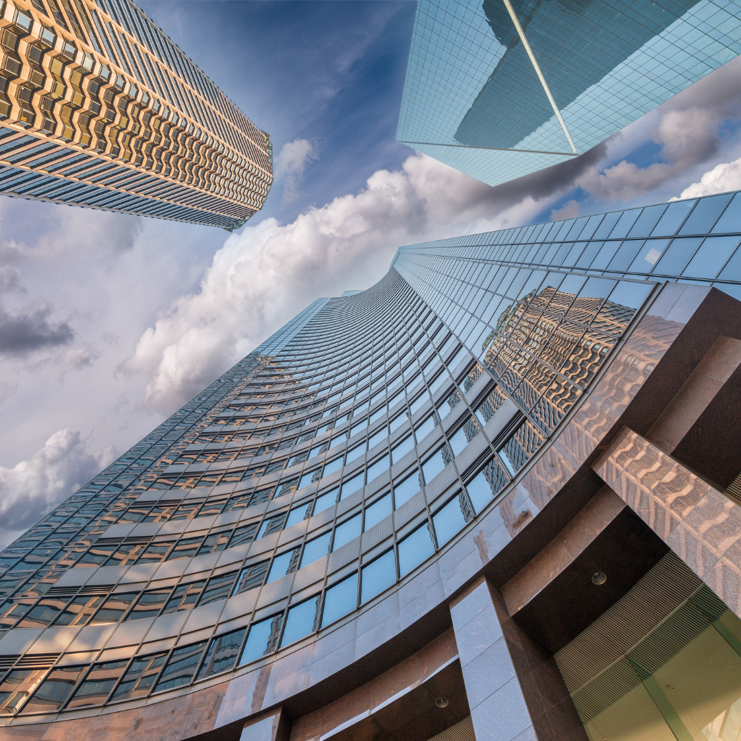 glass buildings and the sky from a frog perspective